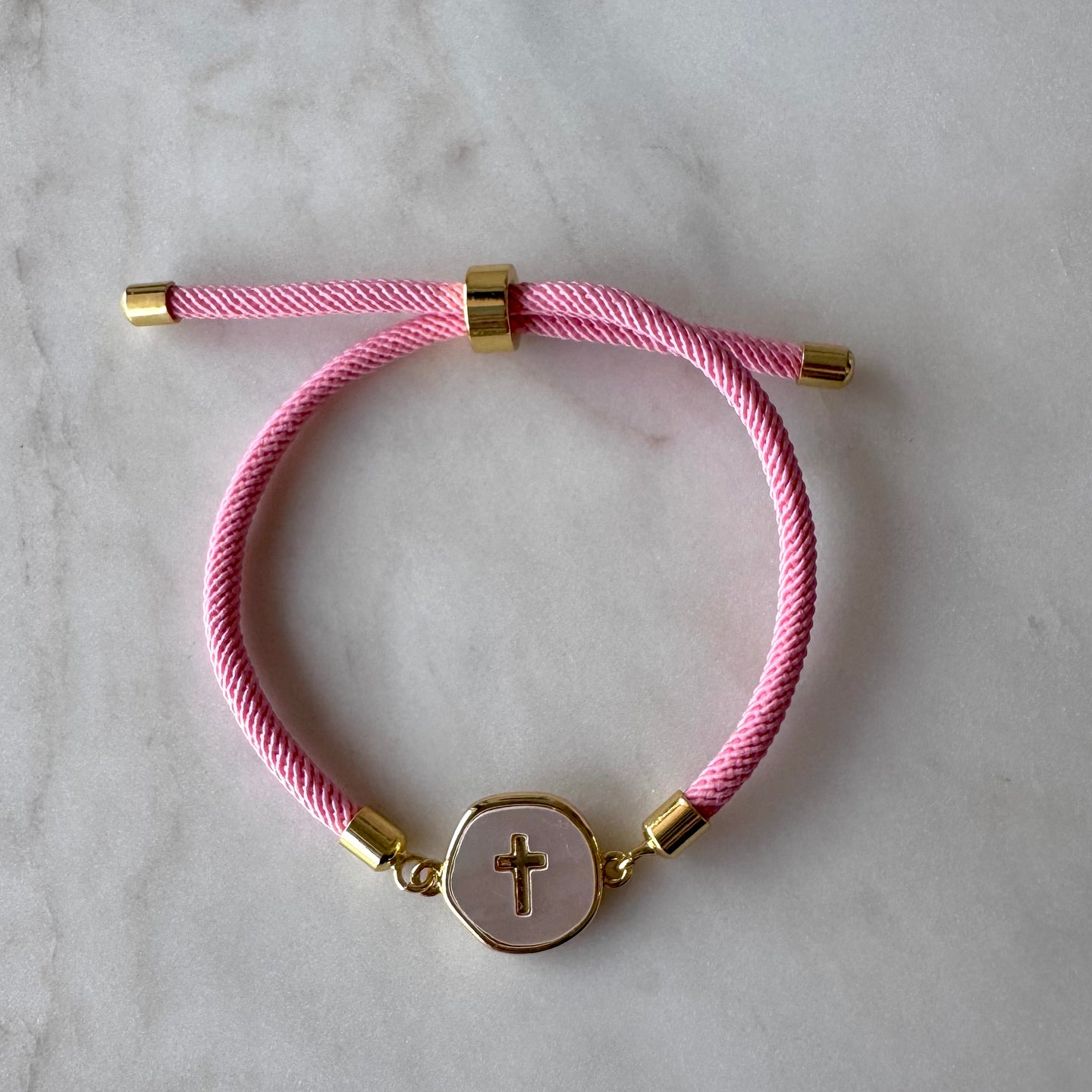 PULSERA ROSA CRUCIFIJO